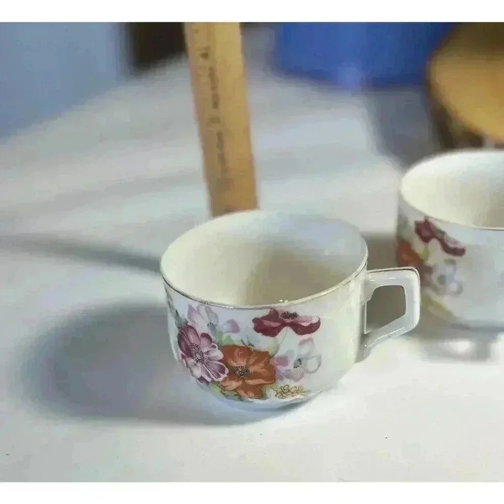 Occupied Japan pair demitasse Cups floral decal bouquet